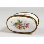 A FRENCH PORCELAIN DOUBLE-ENDED BOX, with gilt mounts and painted with flowers. 3ins long.