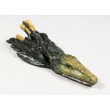 A SMALL VIENNA STYLE COLD PAINTED BRONZE PAPER CLIP, modelled as a head of a crocodile. 5.5ins
