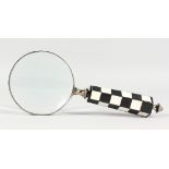 A LADIES MAGNIFYING GLASS with chequered handle.