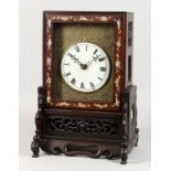 A 19TH CENTURY CHINESE MANTLE CLOCK, with fusee movement and mother-of-pearl inlaid rosewood case.
