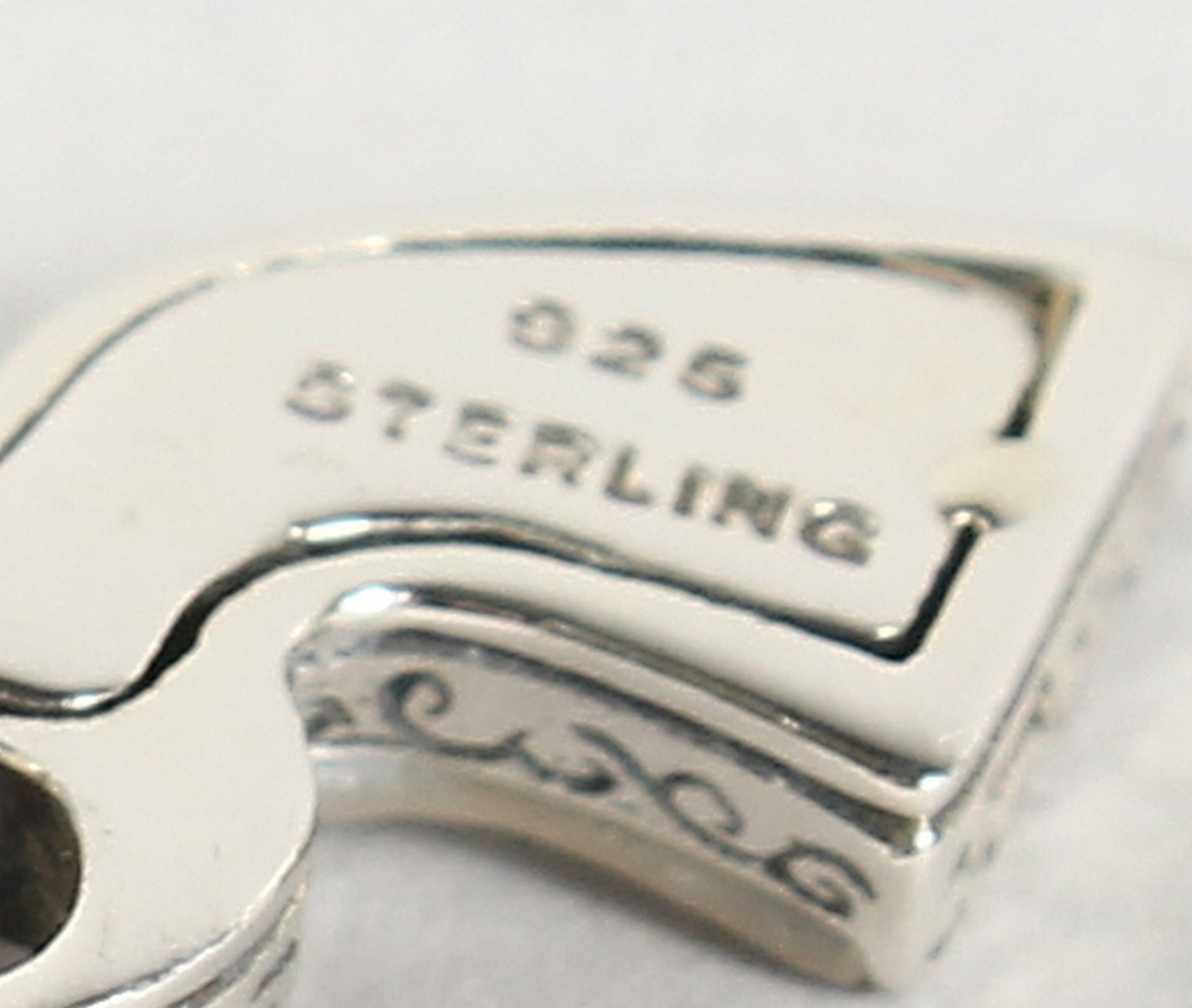 A PAIR OF SILVER AND MOTHER-OF-PEARL PISTOL CUFFLINKS. - Image 3 of 3