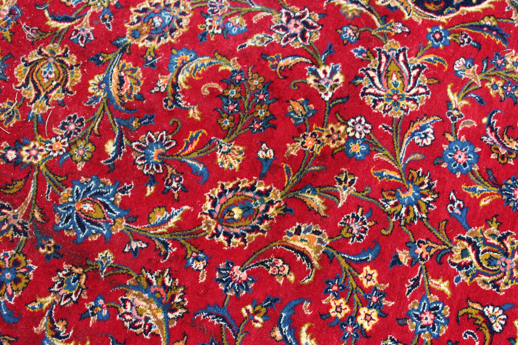 A GOOD LARGE KASHAN CARPET, 20TH CENTURY, claret ground with allover floral decoration. 13ft 0ins - Image 8 of 11