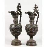 A GOOD LARGE PAIR OF BRONZE CLASSICAL STYLE EWERS. 23ins high.