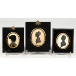 THREE FRAMED SILHOUETTES OF LADIES.