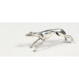 A SMALL SILVER MODEL OF A GREYHOUND. 1.5ins long.