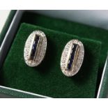 A PAIR OF 9CT GOLD, SAPPHIRE AND DIAMOND DECO DESIGN EARRINGS.