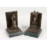 A PAIR OF BRONZE DACHSHUND BOOKENDS, on marble bases. 11ins high.