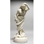 A 19TH CENTURY PARIAN FEMALE FIGURE, holding her head. 15ins high.