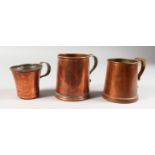 THREE EARLY COPPER MUGS.