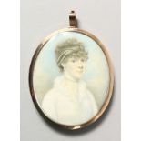 A GOOD 19TH CENTURY DOUBLE SIDED MINIATURE, a gentleman in a blue coat and lady with pearls in her