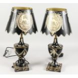 A PAIR OF TOLEWARE STYLE URN SHAPED TABLE LAMPS AND SHADES. 22ins high.