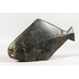 AN INUIT CARVED HARDSTONE GROUP OF A FLAT FISH. Etched on base E 9-78 78. 10.5ins long.
