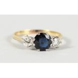 A GOOD 18CT GOLD, SAPPHIRE AND DIAMOND RING.