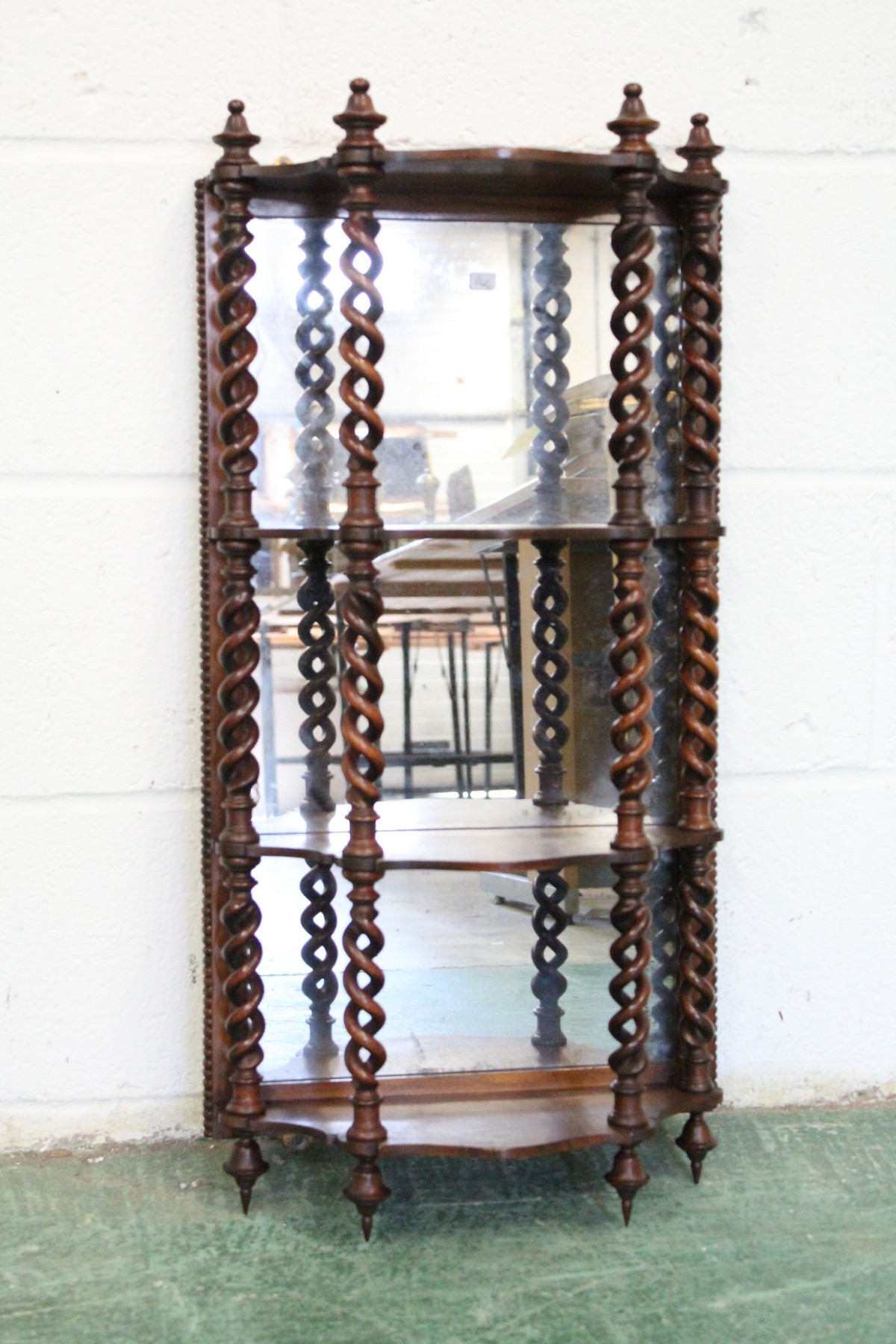 A GOOD 19TH CENTURY ROSEWOOD WALL SHELF, with a mirrored back, the shelves united by open barley - Image 3 of 4