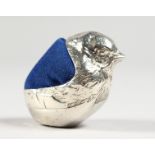 A MODERN SILVER BIRD SHAPE PIN CUSHION. 2ins long.