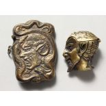 TWO BRASS DEVIL HEAD VESTAS.