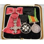 A GROUP OF MINIATURE MEDALS.