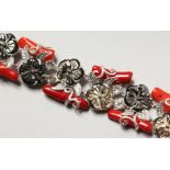 A SILVER, CORAL AND MOTHER-OF-PEARL BRACELET. 7.5ins long.