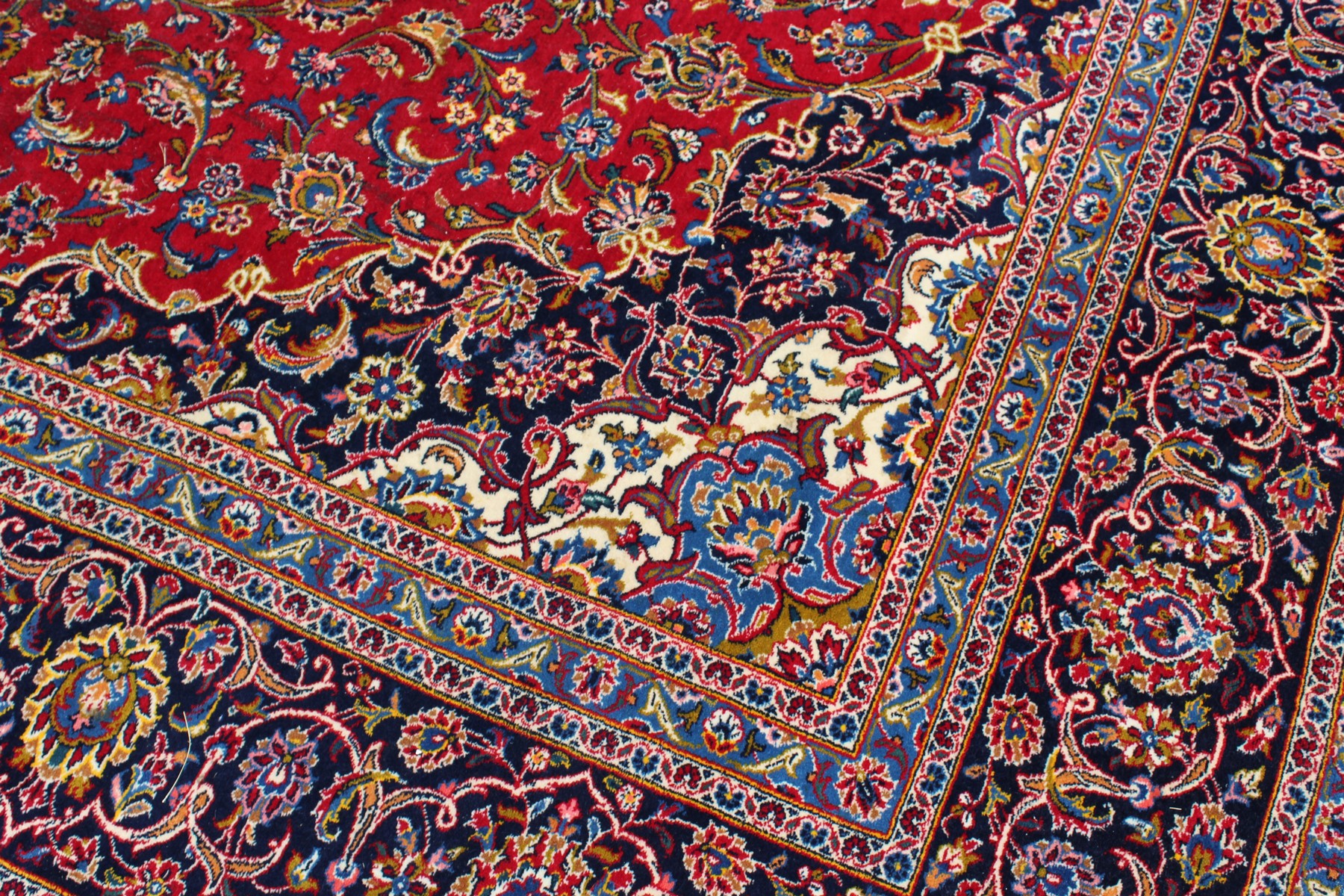 A GOOD LARGE KASHAN CARPET, 20TH CENTURY, claret ground with allover floral decoration. 13ft 0ins - Image 7 of 11