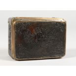 A 19TH CENTURY TORTOISESHELL BOX AND COVER, with musical trophies. 3ins long.