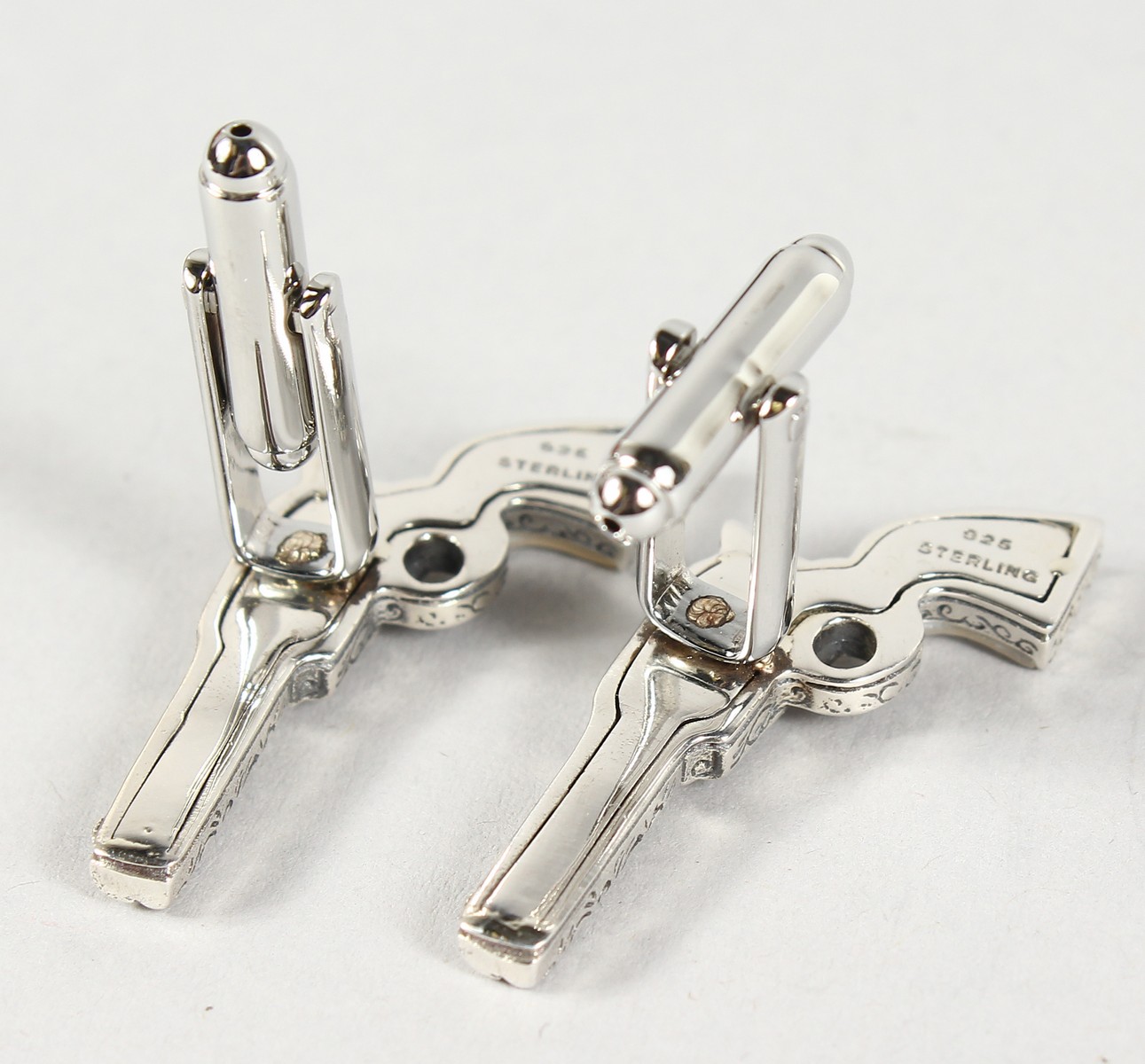 A PAIR OF SILVER AND MOTHER-OF-PEARL PISTOL CUFFLINKS. - Image 2 of 3