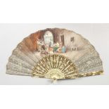 A GOOD IVORY AND PAPER FAN, painted by A. BASTITE, classical scene, in a box.