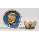 A VIENNA BLUE CUP AND SAUCER, with sepia panels of birds and animals. Mark in blue.