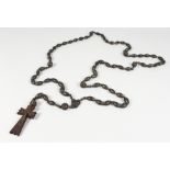 A SET OF ROSARY BEADS.