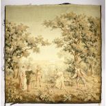 A BRUSSELS STYLE TAPESTRY WALL HANGING, depicting figures in a parkland setting (AF). 8ft 4ins