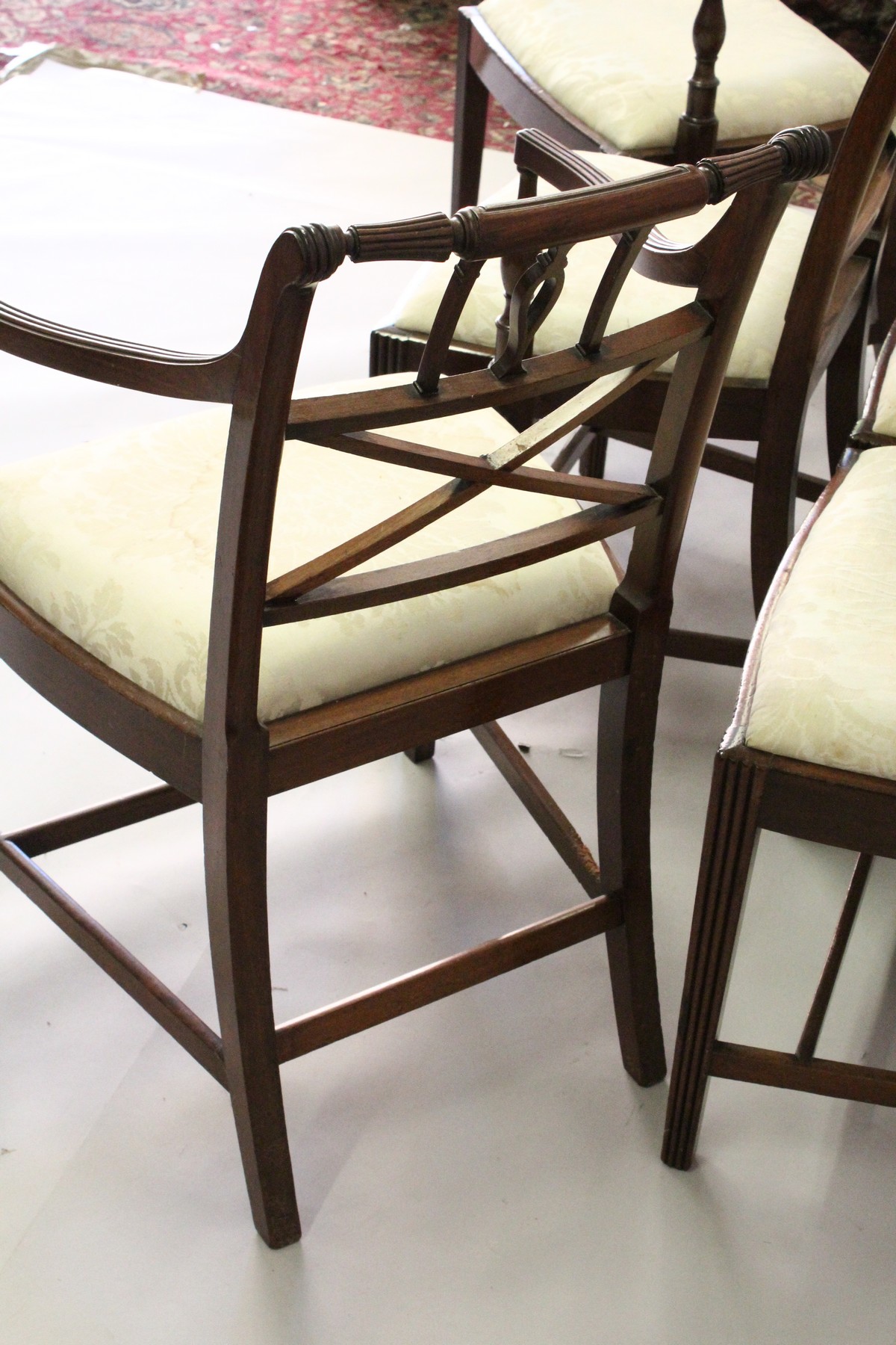 A SET OF SIX EARLY 20TH CENTURY MAHOGANY DINING CHAIRS, two with arms, all with turned and carved - Image 5 of 6