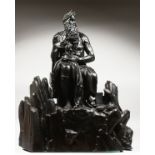 AFTER MICHELANGELO - AN IMPRESSIVE LARGE BRONZE OF MOSES seated on rocks, a tablet under his arm.