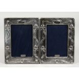 A PAIR OF ART NOUVEAU STYLE PHOTOGRAPH FRAMES. 7.25ins x 5.5ins.