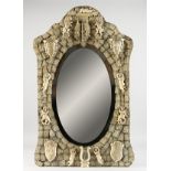 A GOOD DIEPPE PRISONER OF WAR CARVED BONE MIRROR, CIRCA. 1860, with emblems, shields, etc., with