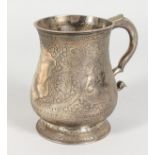 AN EARLY INDIAN COLONIAL SILVER PINT TANKARD, chased decoration. Maker's mark: I. R.
