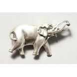 A SILVER ELEPHANT SHAPE BROOCH.