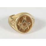 A 9CT GOLD MASONIC RING.