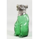 A BEAR SHAPED DECANTER, with plated head and green glass body. 9ins high.