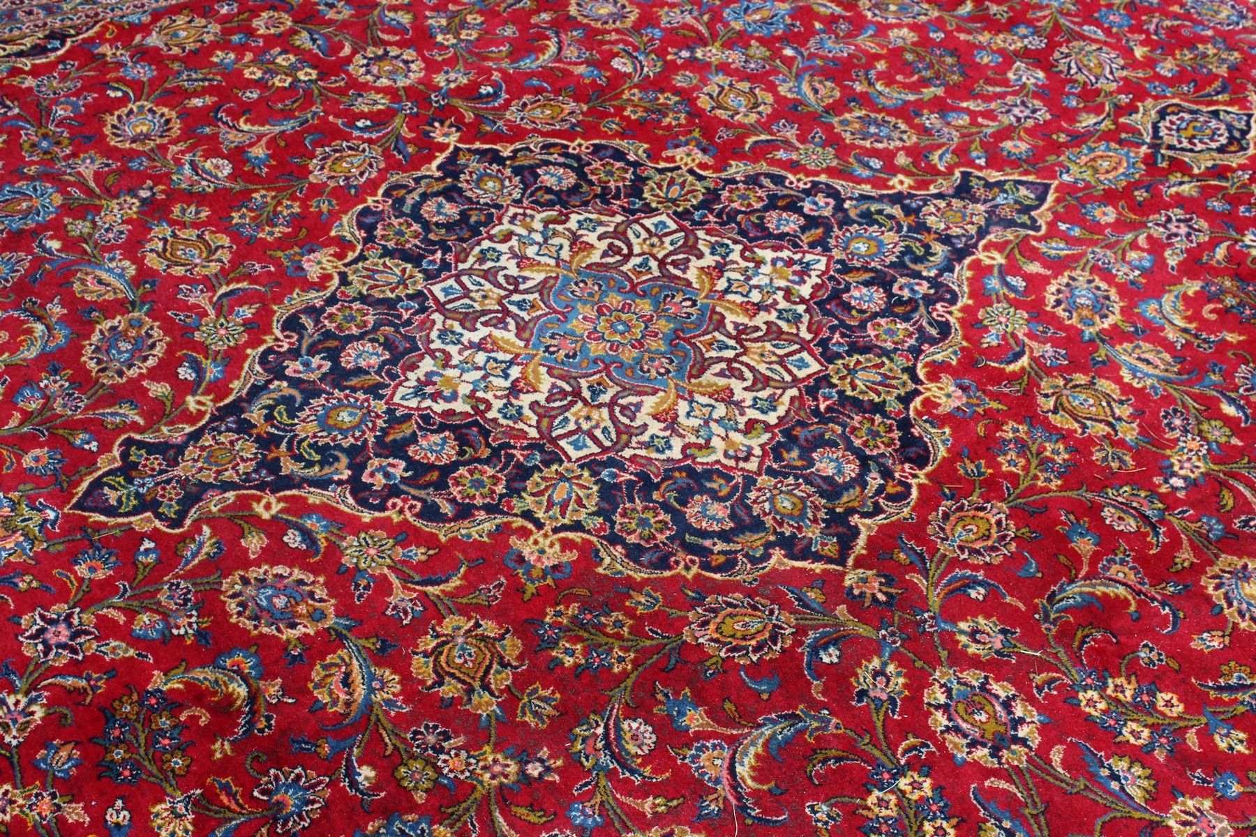 A GOOD LARGE KASHAN CARPET, 20TH CENTURY, claret ground with allover floral decoration. 13ft 0ins - Image 3 of 11