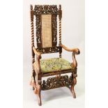 A 17TH CENTURY STYLE "CAROLEAN" WALNUT ARMCHAIR, probably 19th century or earlier, with figural