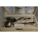 David Anderson, Norway, two silver and enamel spoons, boxed.