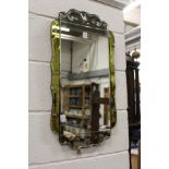 A decorative engraved glass Art Deco wall mirror.