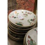 Ten small Chinese floral decorated saucers.