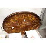 A good inlaid mahogany oval twin handled tray.