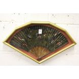 A framed and glazed Chinese fan.