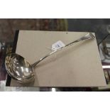 A George III silver ladle.