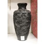 A Chinese cinnabar lacquer style vase.