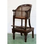 A Victorian mahogany child's Bergere style high-chair with stand.