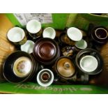 A quantity of Denby style dark brown glazed earthenware dinner ware coffee cups and saucers etc.