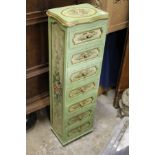 A painted narrow chest of drawers.
