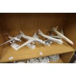 Four model aeroplanes.